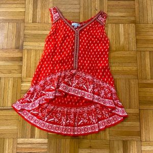 Patterned and beautifully beaded top!